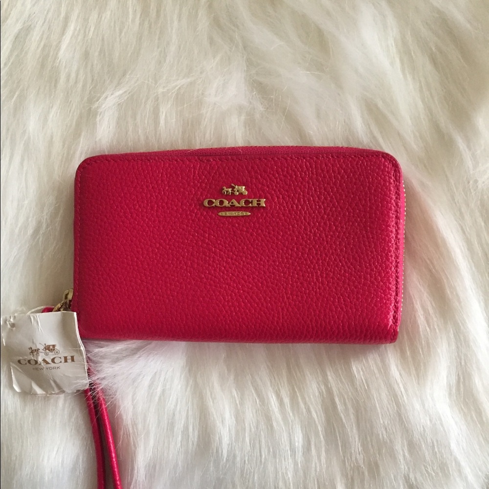 Coach hot pink wristlet